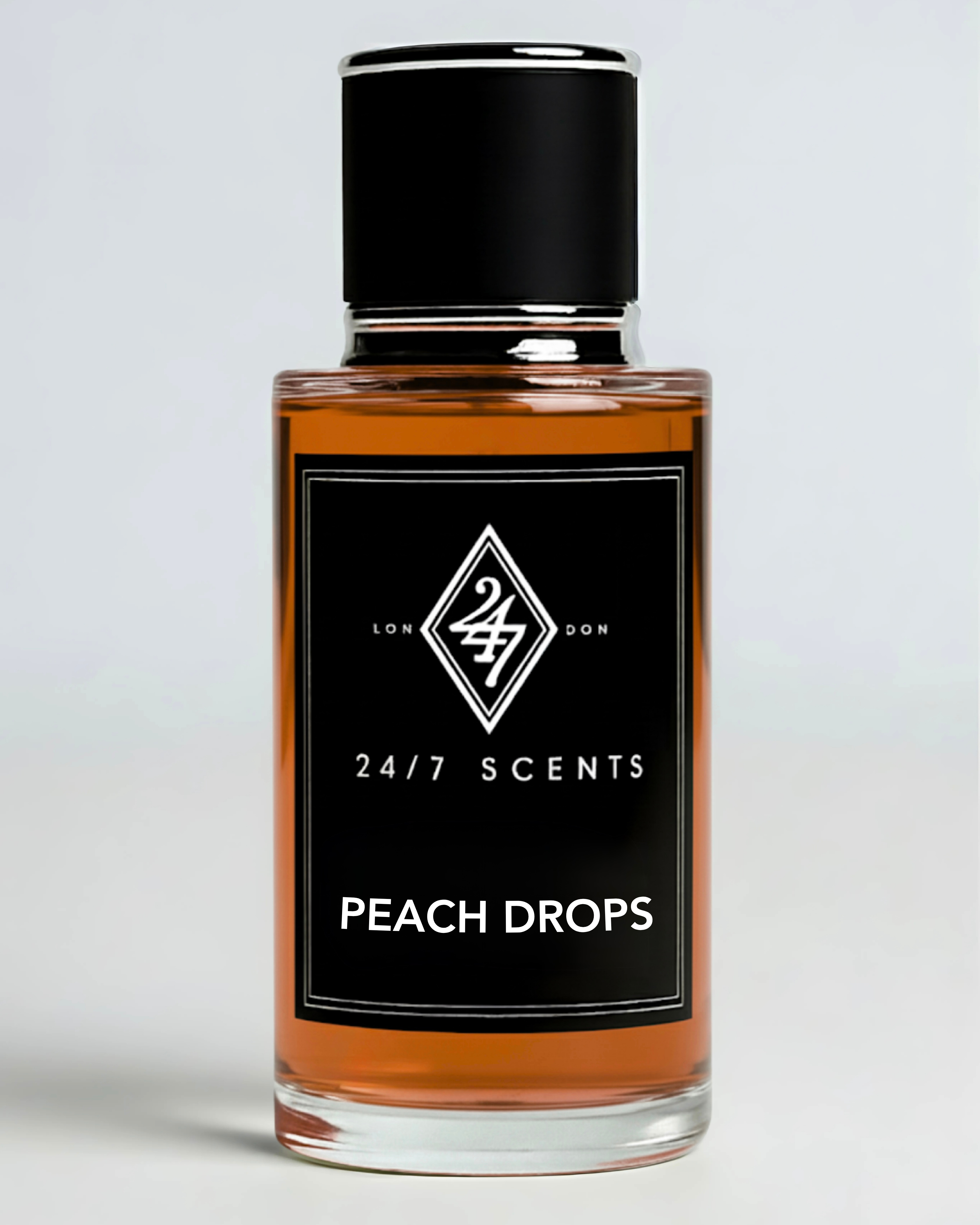 Peach Drops – a luxury fragrance with notes of peach, blood orange, jasmine, vanilla, and patchouli. Bold, sensual, and long-lasting for any occasion.